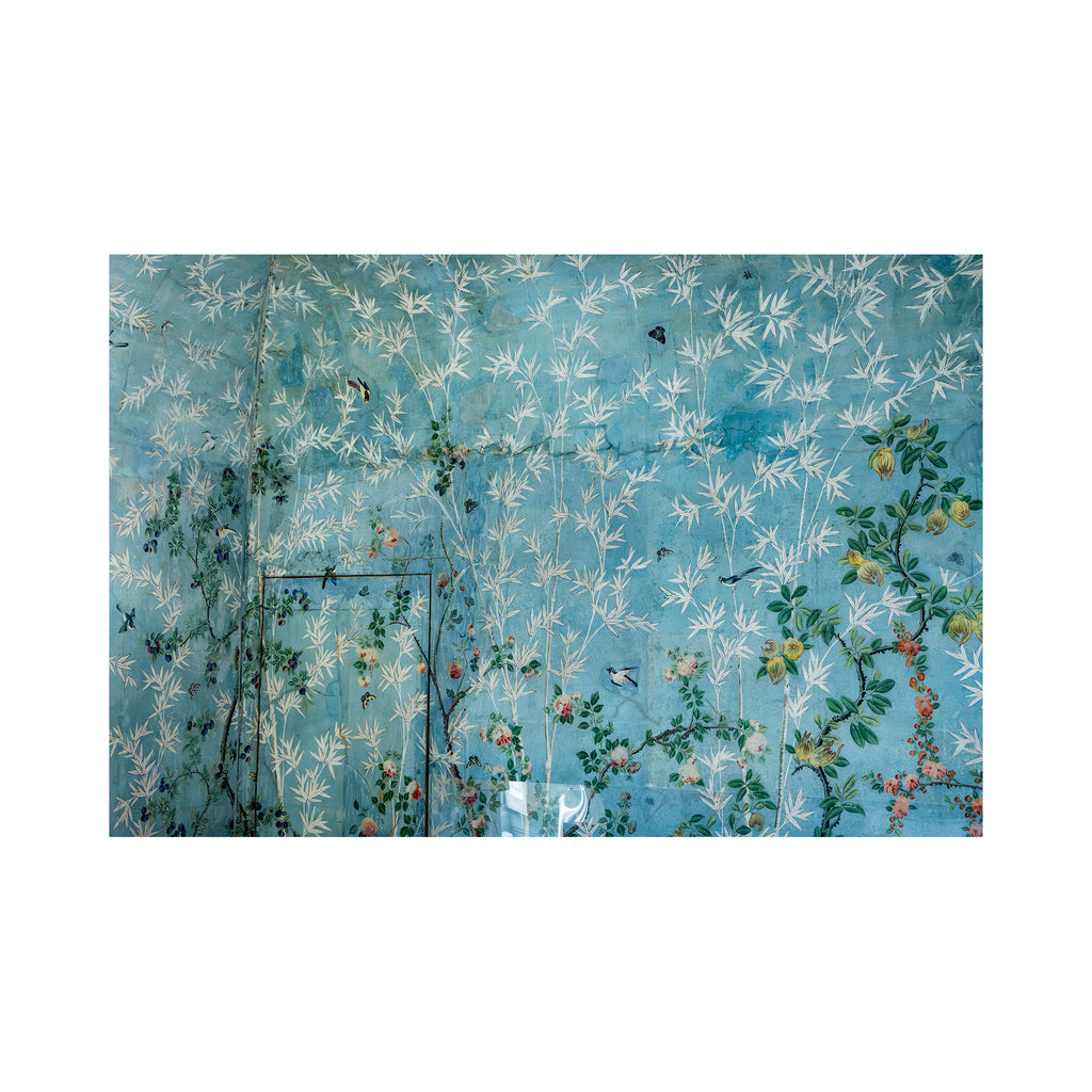 Decorative fabric wallpaper mural  with floral and bird pattern on a blue background